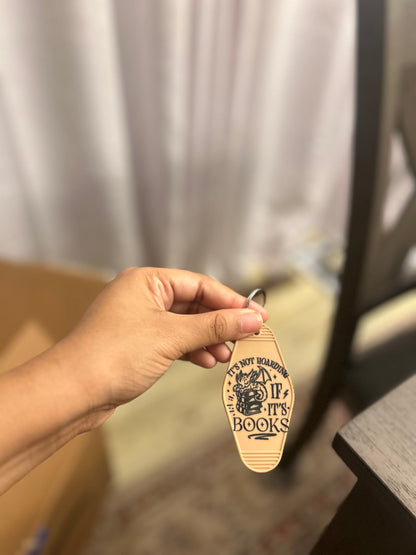 “It’s not hoarding, if it’s books” motel keychain