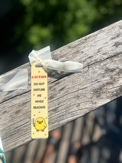 “CAUTION: do not disturb me while I’m reading” bookmark 🐥🔪