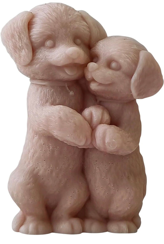 Pups hugging candle 🐾