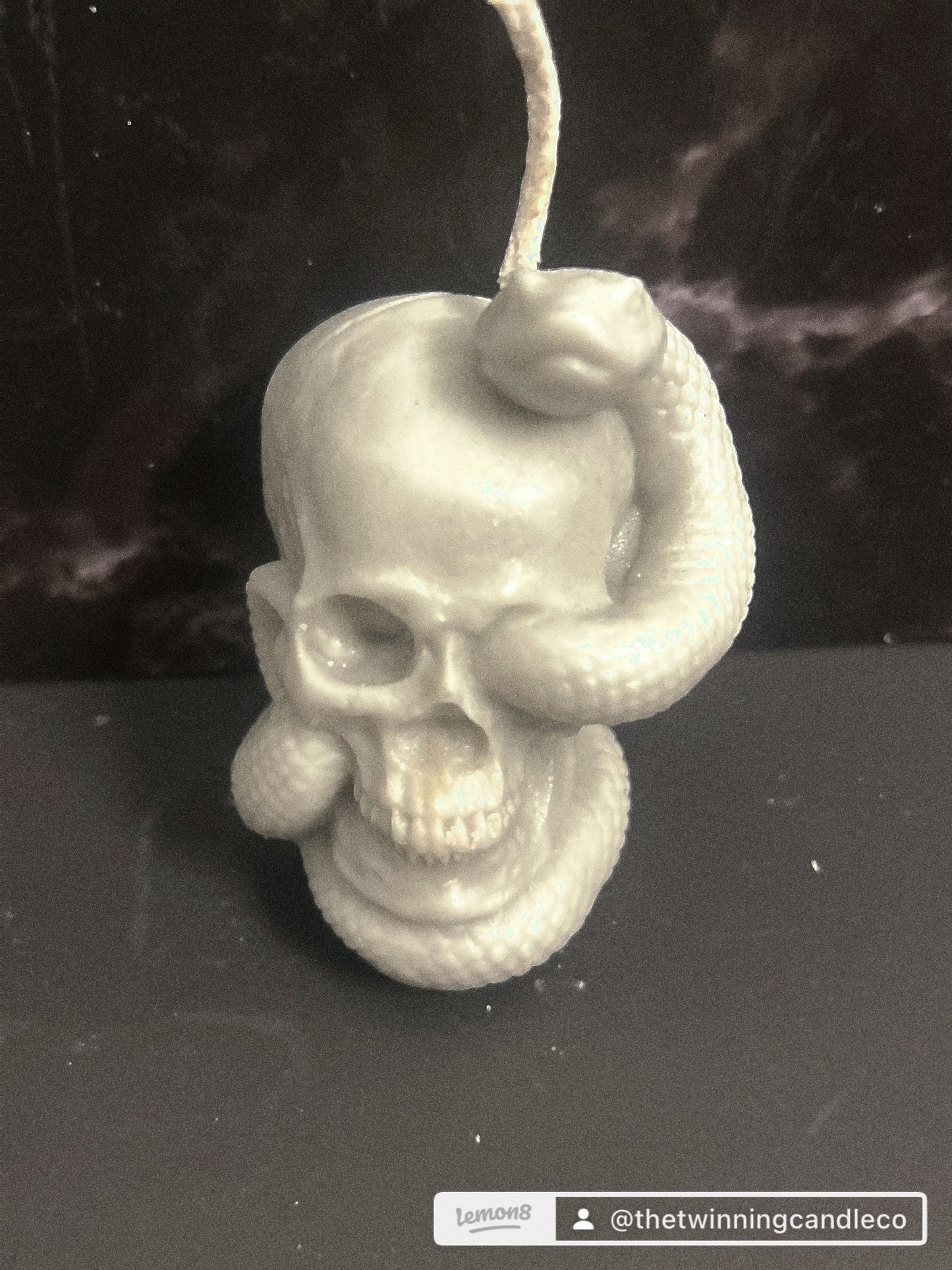 Skull snake candle